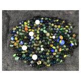 Lot of Collectible Marbles - some of them glow green when hit with a black light