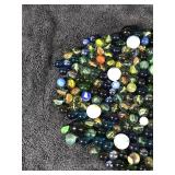 Lot of Collectible Marbles - some of them glow green when hit with a black light