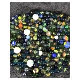 Lot of Collectible Marbles - some of them glow green when hit with a black light