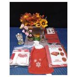 Christpher collection figurine, flowers, candle, storage bag, gift wrap organizer, tablecloths, oil lamp, and towel