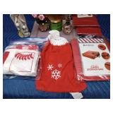 Christpher collection figurine, flowers, candle, storage bag, gift wrap organizer, tablecloths, oil lamp, and towel