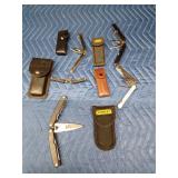 5 Leatherman tools and 5 cases