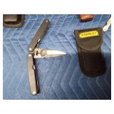 5 Leatherman tools and 5 cases