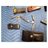 5 Leatherman tools and 5 cases