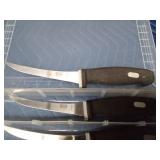 4 Kaicut fillet knives in a plastic tackle organizer