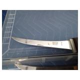 4 Kaicut fillet knives in a plastic tackle organizer