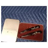 Pair of Winchester pocketknives in original Winchester tin