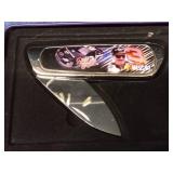 In memory... Dale Earnhardt tin and knife set