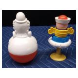 2 vintage toys - 1977 Sanitoy Roly Poly musical chime clown and a 1984 Fisherprice sailor suction cup rattle & squeak toy