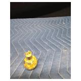 Box of collectibles including a jar of gold flakes, music recorder, and Ninja Turtle lunch box