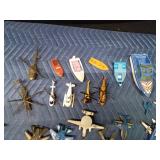 Toy boats, motorcycles, planes, helicopters
