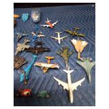 Toy boats, motorcycles, planes, helicopters