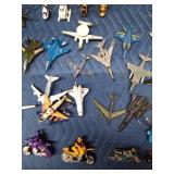 Toy boats, motorcycles, planes, helicopters