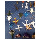Toy boats, motorcycles, planes, helicopters