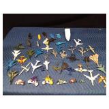 Toy boats, motorcycles, planes, helicopters