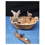Basket of ceramic and wood birds (some on drift wood)