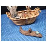 Basket of ceramic and wood birds (some on drift wood)