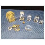 Crystal glass paperweights with different things etched inside and other crystals and more