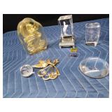 Crystal glass paperweights with different things etched inside and other crystals and more