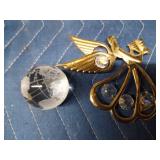 Crystal glass paperweights with different things etched inside and other crystals and more