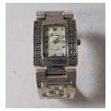 Vintage Bangle Cuff Fashion Watch with a Silver-Toned Metal Band and White Dial and a Geneva Platinum Branded Women