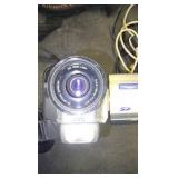 JVC Camcorder, Nikon L105 camera, Eddie Bauer Rechargable  DVD player