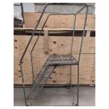 Warehouse rolling ladder