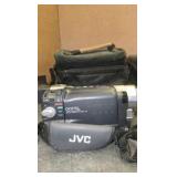 JVC Camcorder, Nikon L105 camera, Eddie Bauer Rechargable  DVD player