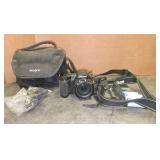 JVC Camcorder, Nikon L105 camera, Eddie Bauer Rechargable  DVD player