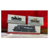 2 Die cast automobiles, 1 southern pacific train