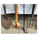 Yard tools shovel, hoe, hatchet, sledge hammer, pick axe
