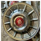 1957 Cadillac chrome sombrero hubcap