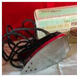 Vintage Toastmaster steam and dry travel iron Model 409