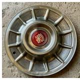 1957 Cadillac chrome sombrero hubcap
