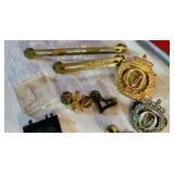 Group of military and merit award pins Norwegian cap badges