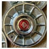 1957 Cadillac chrome sombrero hubcap