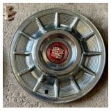1957 Cadillac chrome sombrero hubcap
