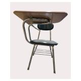 Qty of "22"  school desks school desks featuring a connected top and an under-seat book holder.