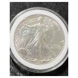 1987 AMERICAN SILVER EAGLE 1 TROY OZ .999 FINE SILVER IN AIRTITE