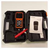 The Foxwell T1000 diagnostic tool used to activate, decode and program tire pressure (TPMS) sensor