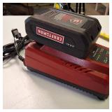 Craftsman V20 2.5 Ah Lithium-Ion Battery (CMCB202) on a compatible Craftsman V20 Battery Charger