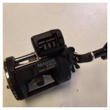 Attn Fishermen:  Okuma Magda Pro line counter trolling reel, long with a companion knife