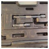 Quinn brand socket set with a ratchet and various sockets