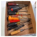 collection of assorted screwdrivers and hand tools from brands such as Craftsman and Klein Tools