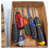collection of assorted screwdrivers and hand tools from brands such as Craftsman and Klein Tools