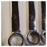 Snap-on combination wrenches