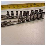 Lot of 16 Snap-on  12-point, shallow metric socket set mounted on a metal rails
