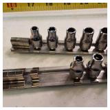 Lot of 16 Snap-on  12-point, shallow metric socket set mounted on a metal rails