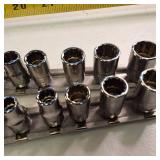 Lot of 16 Snap-on  12-point, shallow metric socket set mounted on a metal rails