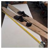 Vintage wooden water skis, a classic recreational combo